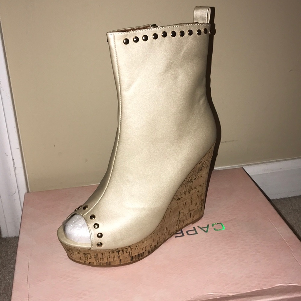 Nude zipper wedge shoe